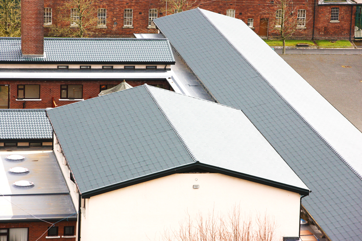 Nordman Tilesheet in use on several large buildings - Tile Effect Cladding